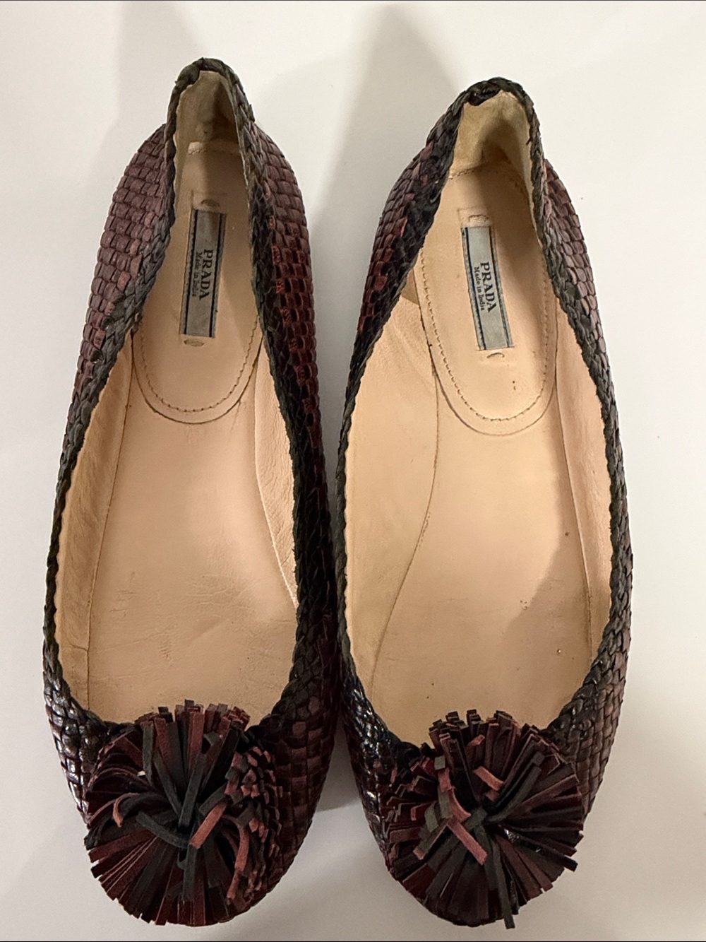 Prada Burgundy Woven Leather Ballet Flats with Pom Pom